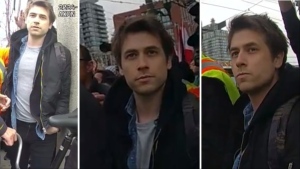 Police search for man accused of assaulting Toronto cop at Saturday's protest