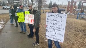 'It's painful for a parent': Mother protests in support of son with autism who was arrested while playing