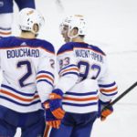 Oilers keep rolling with 4-2 victory over reeling Flames