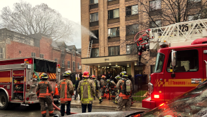 Person rescued after hanging from window to escape downtown Toronto fire: TFS