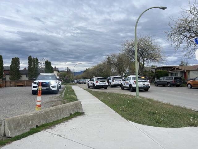 Several RCMP cruisers in downtown Kelowna at Ethel and Wilson