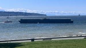 Videos show another barge drifting towards Vancouver beach