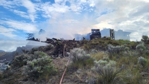 B.C. RCMP seeking pickup driver after 2 abandoned houses burned in Merritt