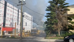 Calgary fire crews at 2-alarm fire in Bowness