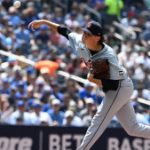 Rogers' grand slam lifts surging Detroit Tigers 7-3 over Toronto Blue Jays