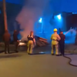 Video shows police officer taking firefighter's hose, spraying people in East Vancouver