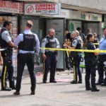 Suspect lit Surrey shopkeeper on fire, witness says