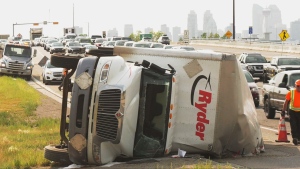Truck rolls over, disrupting long weekend traffic in Calgary