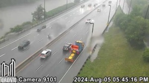 'Slow down and use extreme caution,' say Toronto police, as flooding seen on parts of the DVP