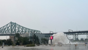 Major water main break floods Montreal near the Jacques Cartier Bridge