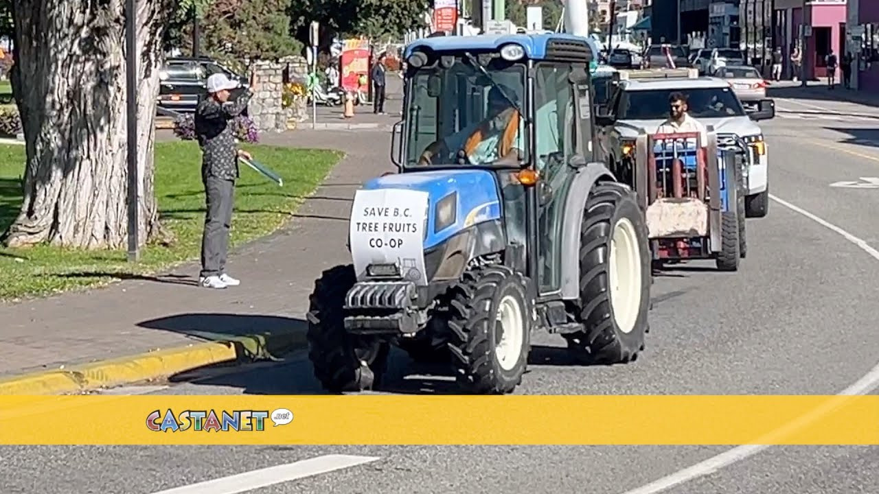 Farmers drive tractors across Bennett Bridge to protest potential sale and break-up of BC Tree Fruits