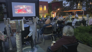 Trip down memory lane: Seniors watch 'Grease' at B.C. care home's simulated drive-in