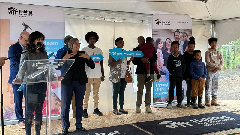 First residents of Habitat Manitoba’s largest development receive keys to new homes