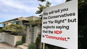 B.C. NDP called 'communist' on sign outside of Lululemon founder Chip Wilson's mansion