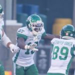 Roughriders edge Elks 28-24, clinch playoff berth