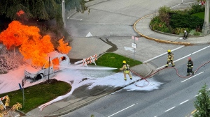 Senior charged after minivan set ablaze outside Vancouver City Hall