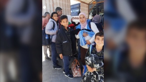 Palestinian woman who gave birth at a refugee camp recounts long journey to Calgary