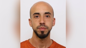 Police search for 'armed and dangerous' man in suspicious death