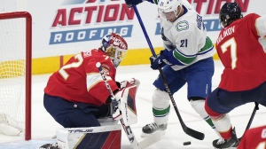 Miller scores winner in OT as Vancouver tops Florida 3-2