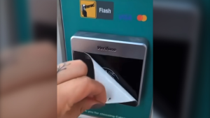 'No need to worry' about stickers on tap payment readers, Calgary Parking says