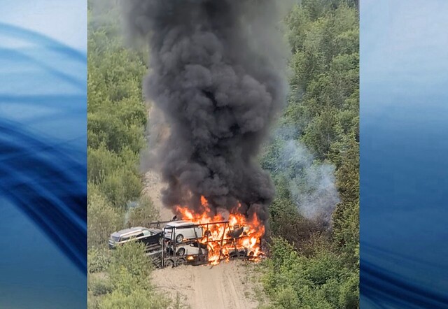 Auto hauler on runaway lane goes up in flames on Highway 97C