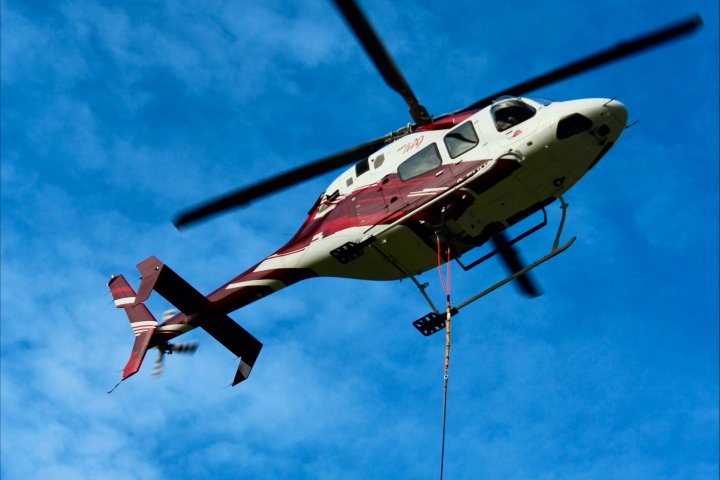 Crews responding to wildfire near Hope find wanted man stranded on cliff