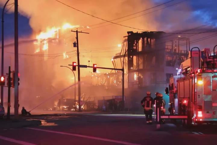 Crews respond to large fire at Langley apartment building under construction