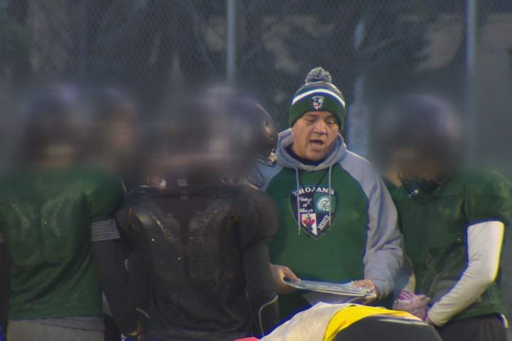Former students and victims of disgraced football coach sue school division