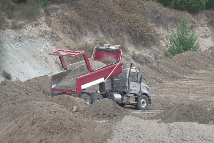 B.C. residents living near quarry say dumped biosolids smell ‘like a dead body’