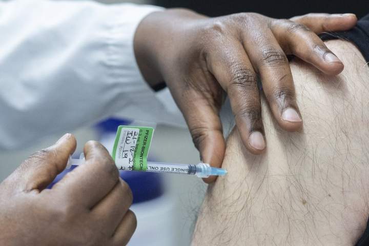 Vaccine report card grades Manitoba C+
