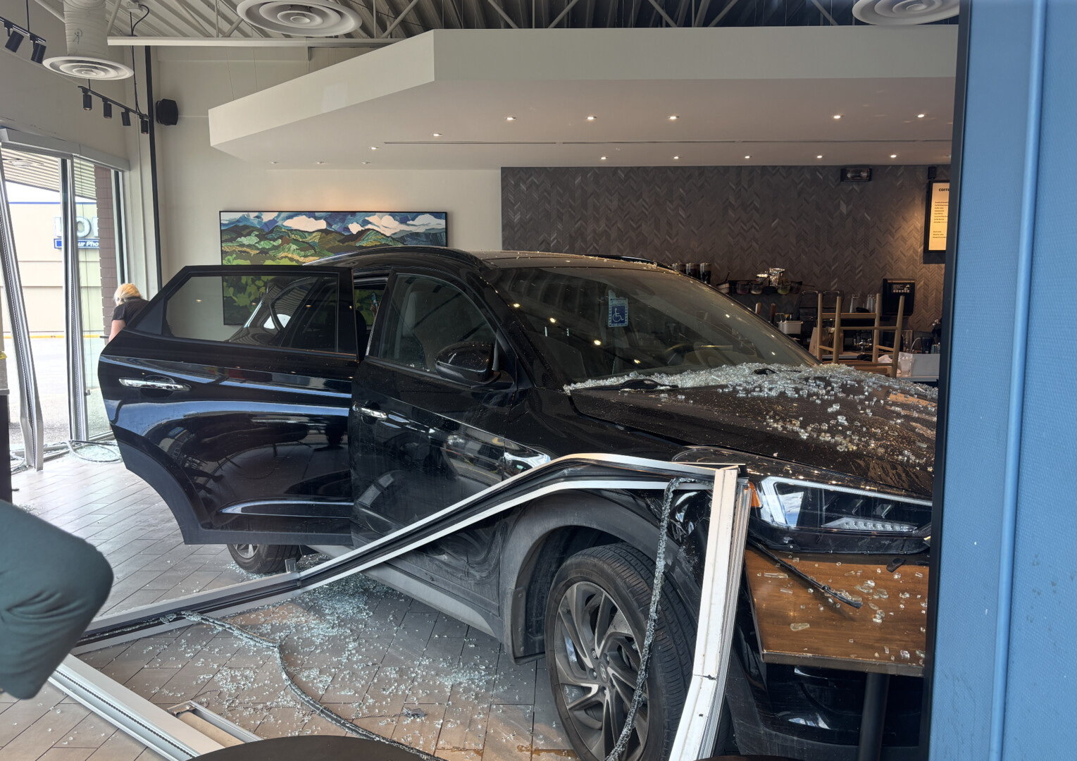 SUV crashes through storefront at Kelowna Starbucks