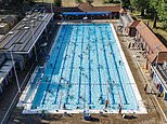 Britain's longest-ever heatwave? Hot weather could surpass 16-day record in 1976 as temperatures intensify to 36C today and spread across country amid 'essential rail travel only' alert