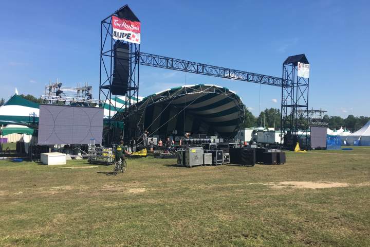 Edmonton’s summer of rain has Folk Fest trucking in sand, Fringe hiring meteorologist