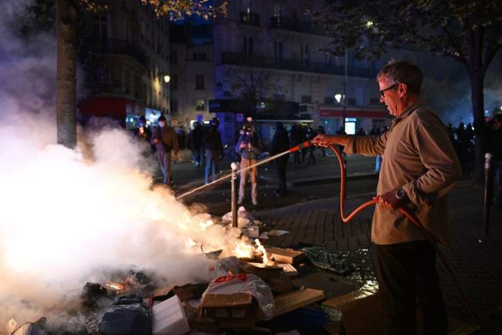 Macron condemns rioting during nationwide protests over schools