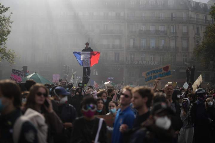 France’s prime minister calls for localized curfews in cities to curb rioting